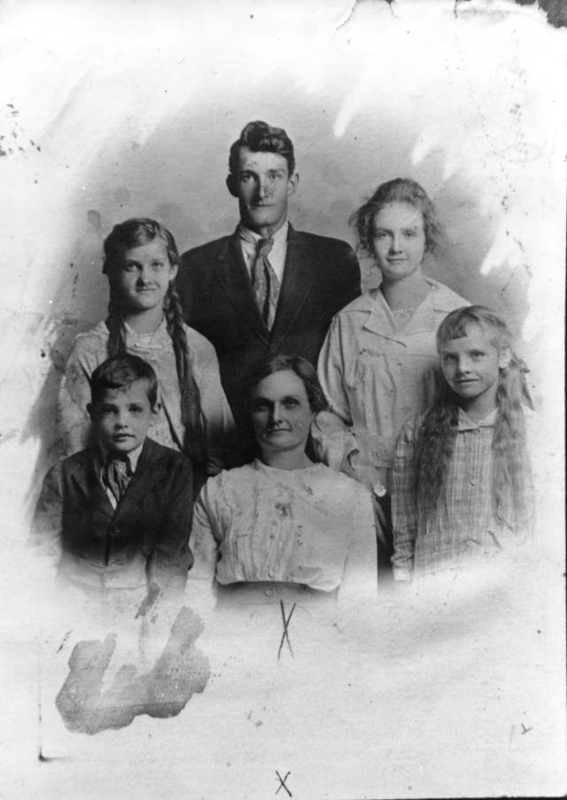 Frank Moss and his siblings and mother