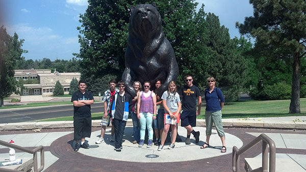 Upward bound Students in front of UNC Bear