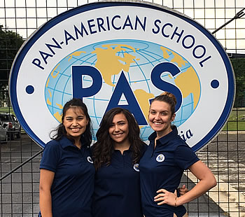 Alyssa Montoya, Kelly McCabe and Sydney Sherman at their teaching abroad program site, the Pan-American School in Costa Rica