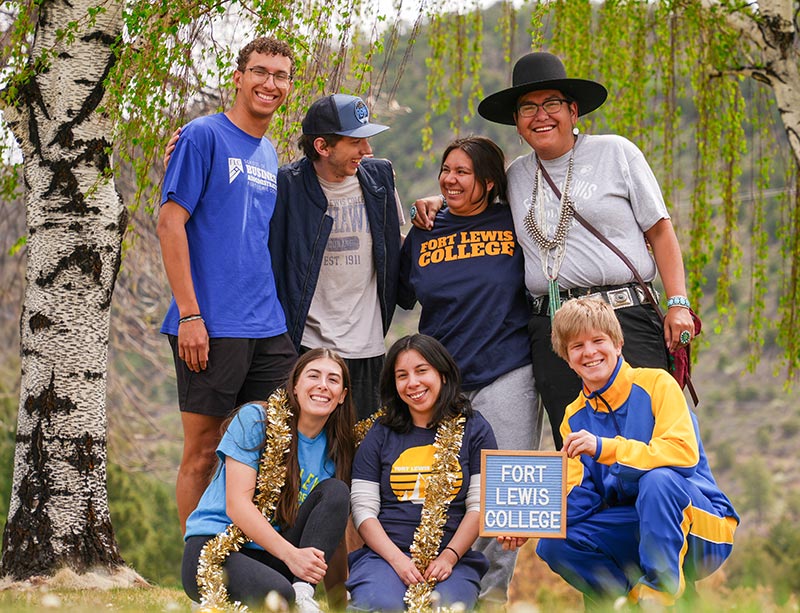 group of flc students in the forest smiling