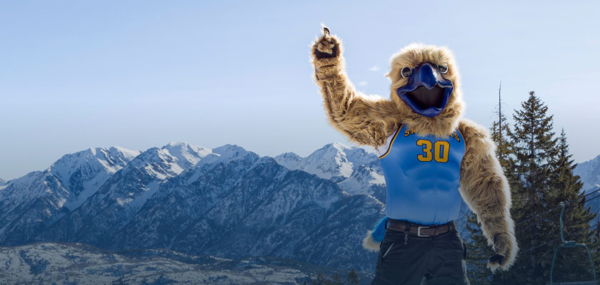 Fort Lewis College mascot with mountain backdrop