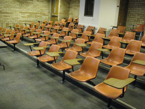 Classroom with stadium seating and fixed tab arm chairs